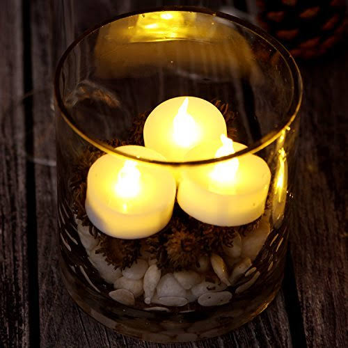 100 Battery Operated LED Warm White Tea Light Candle L6141